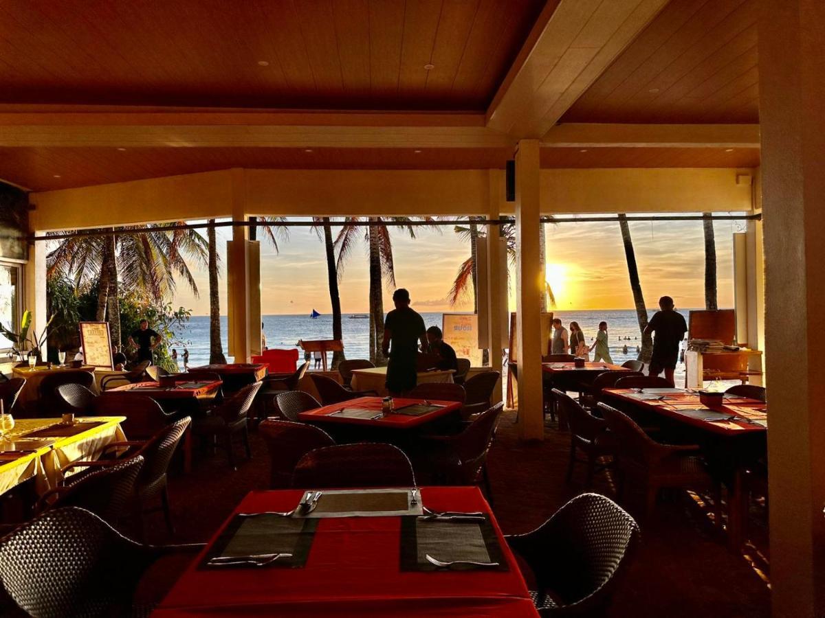 Calypso Beach And Dive Resort Manoc-Manoc Экстерьер фото