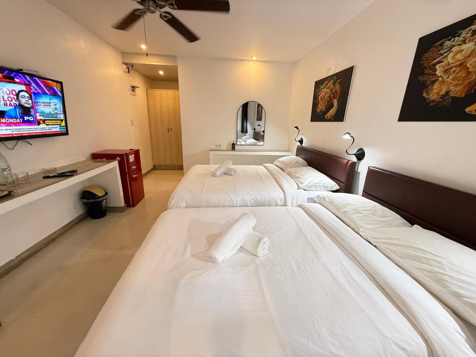 Calypso Beach And Dive Resort Manoc-Manoc Экстерьер фото