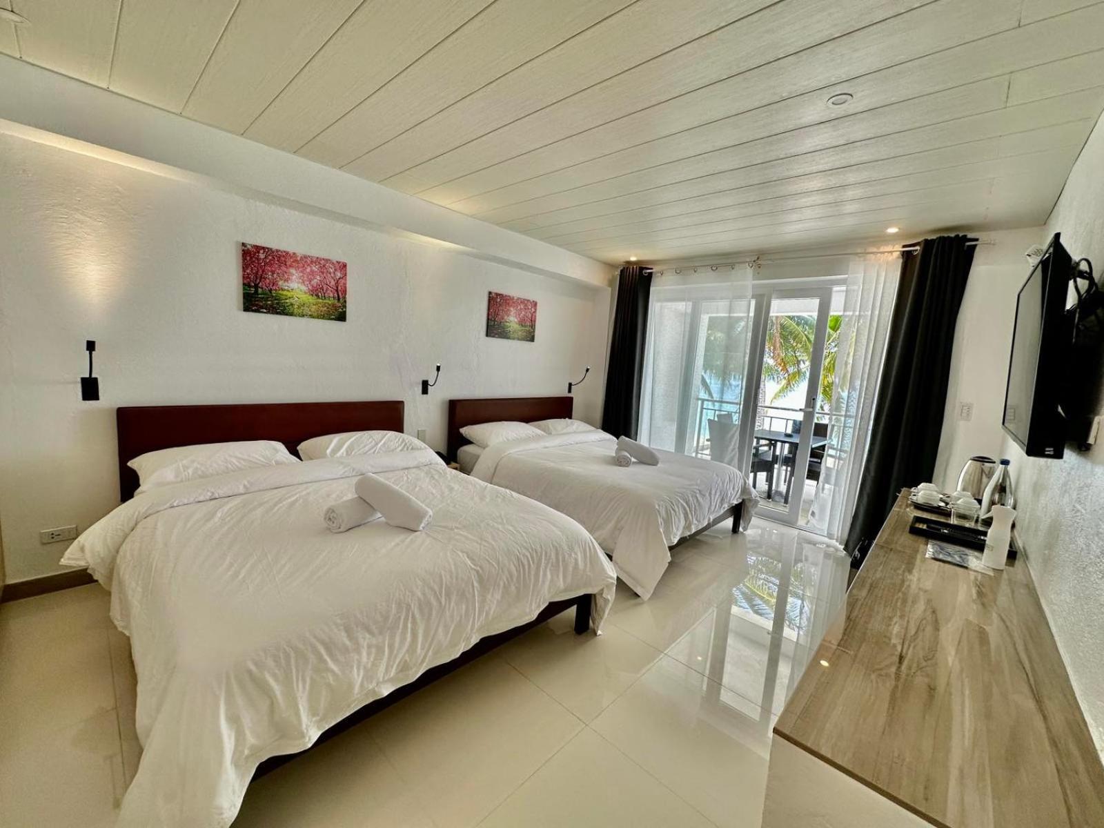 Calypso Beach And Dive Resort Manoc-Manoc Экстерьер фото