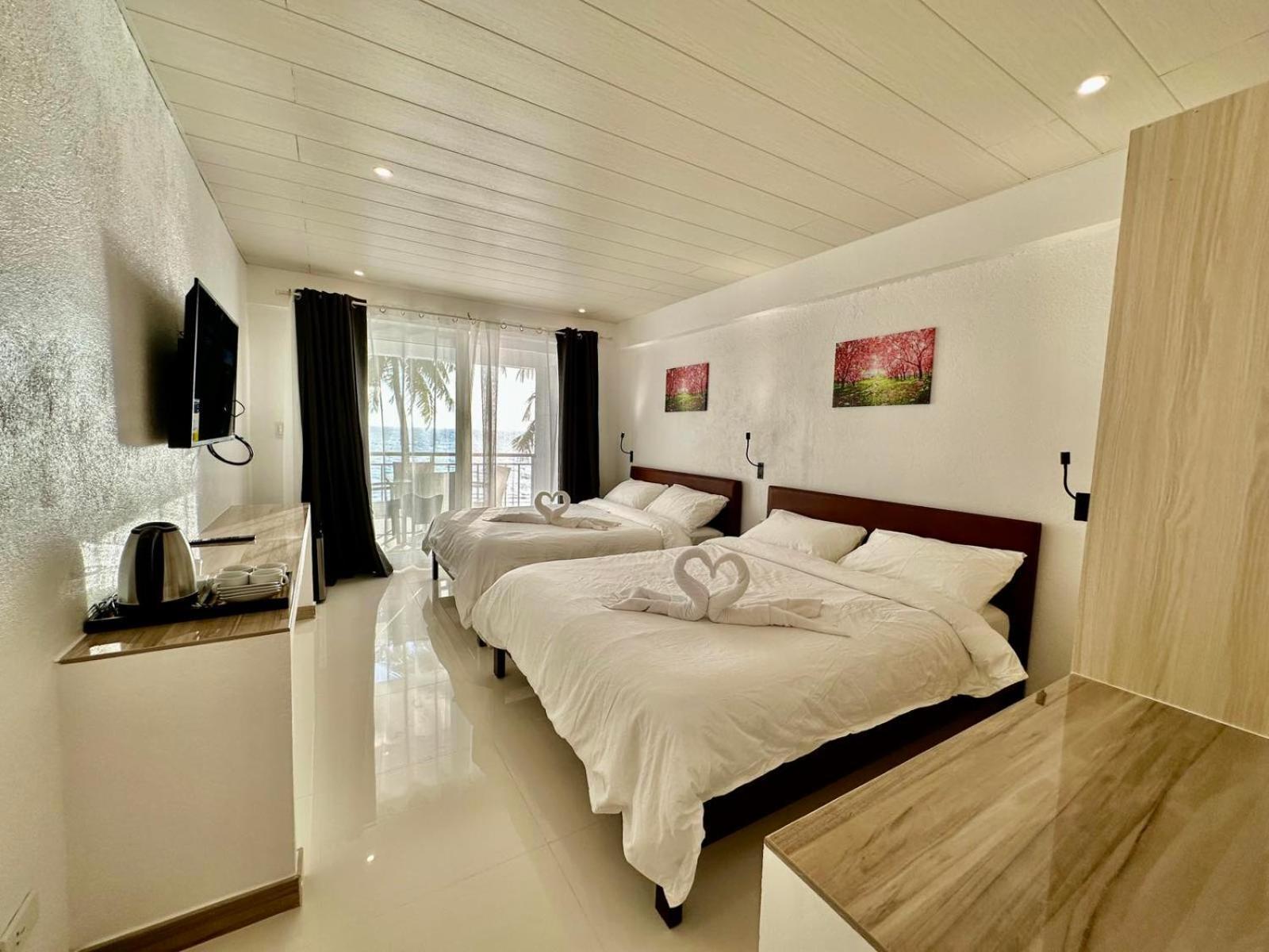 Calypso Beach And Dive Resort Manoc-Manoc Экстерьер фото
