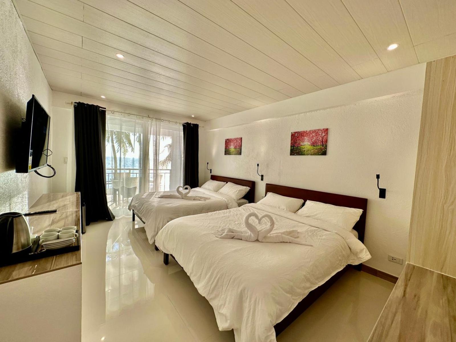 Calypso Beach And Dive Resort Manoc-Manoc Экстерьер фото