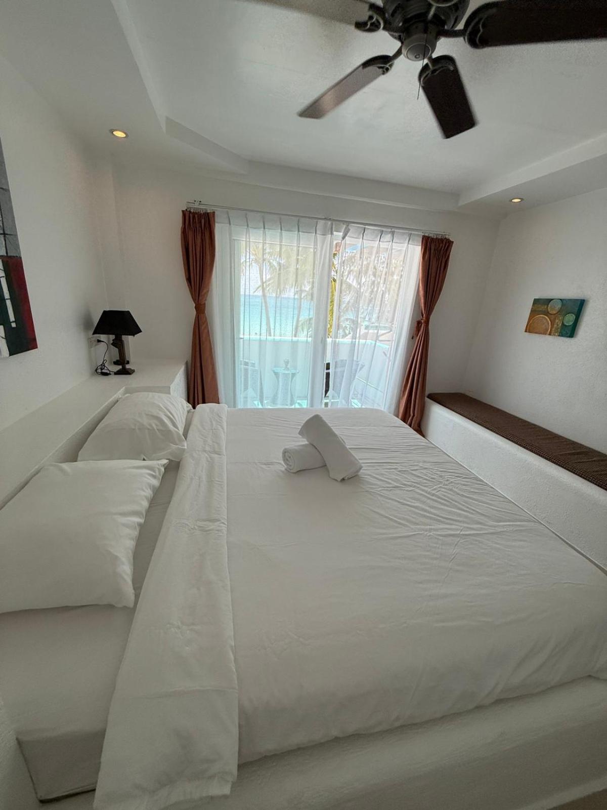 Calypso Beach And Dive Resort Manoc-Manoc Экстерьер фото