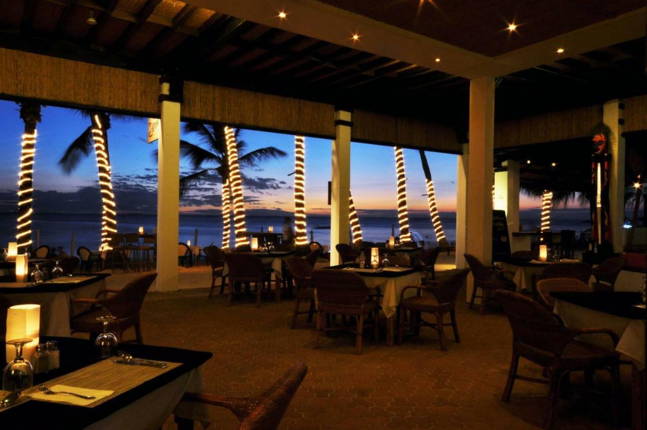 Calypso Beach And Dive Resort Manoc-Manoc Экстерьер фото
