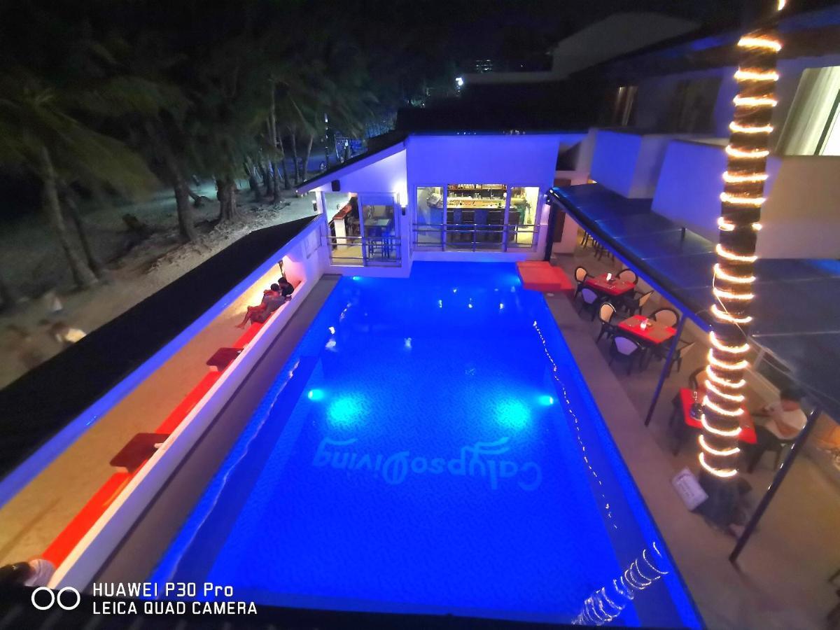 Calypso Beach And Dive Resort Manoc-Manoc Экстерьер фото
